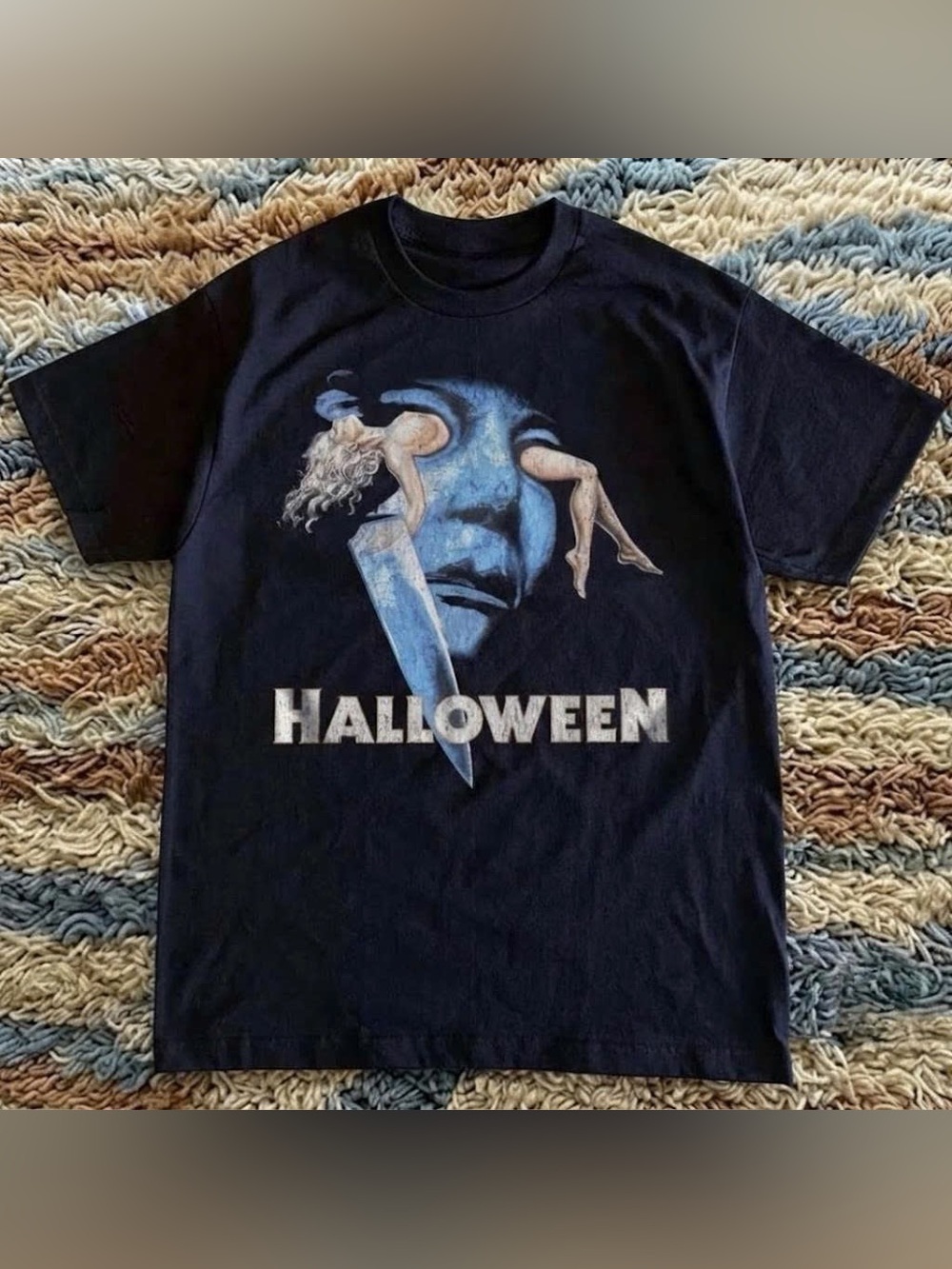 Vintage Black Tee with Blue Horror Mask, Knife and White 'HALLOWEEN' Text